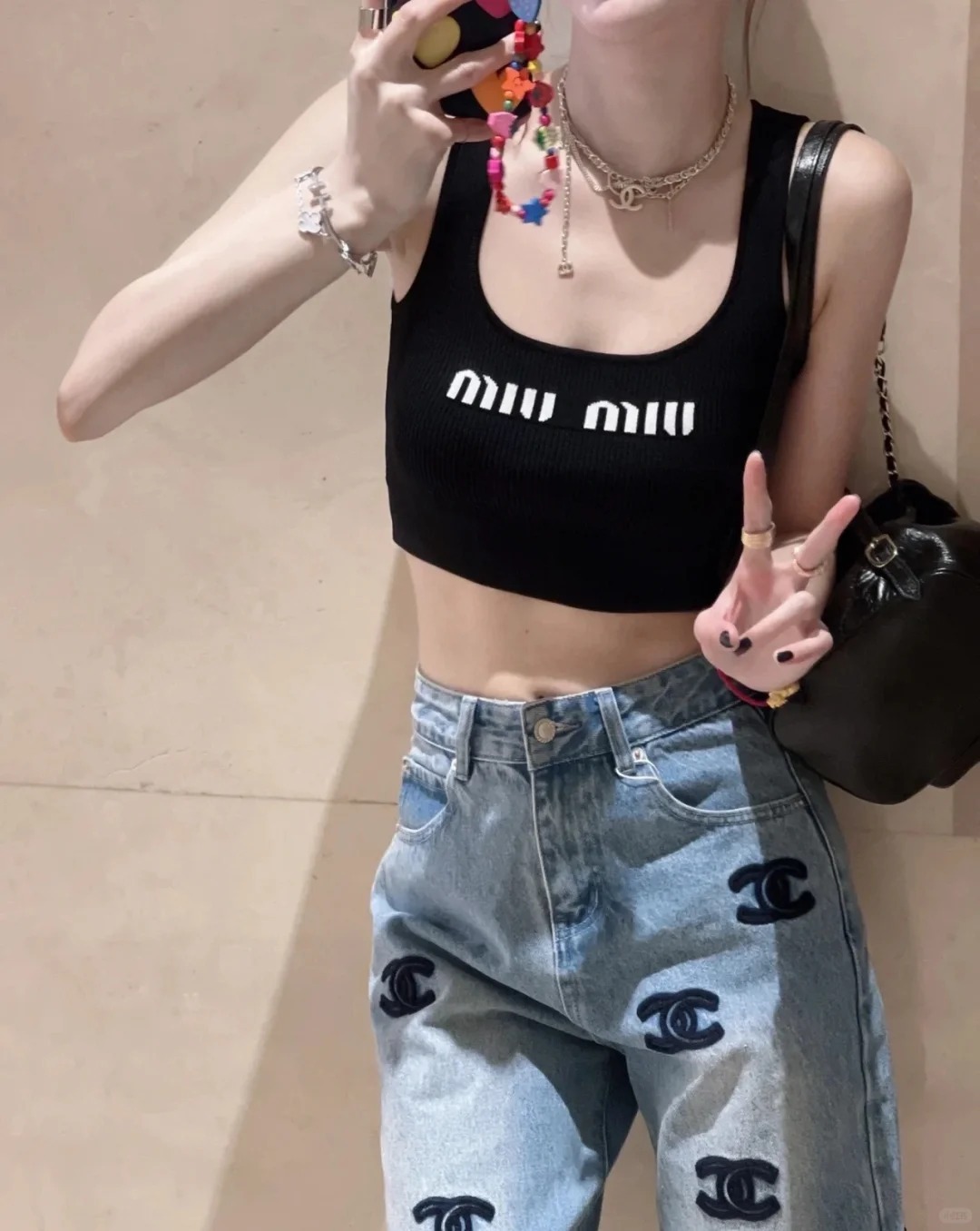 MIU monogrammed jacquard knit vest