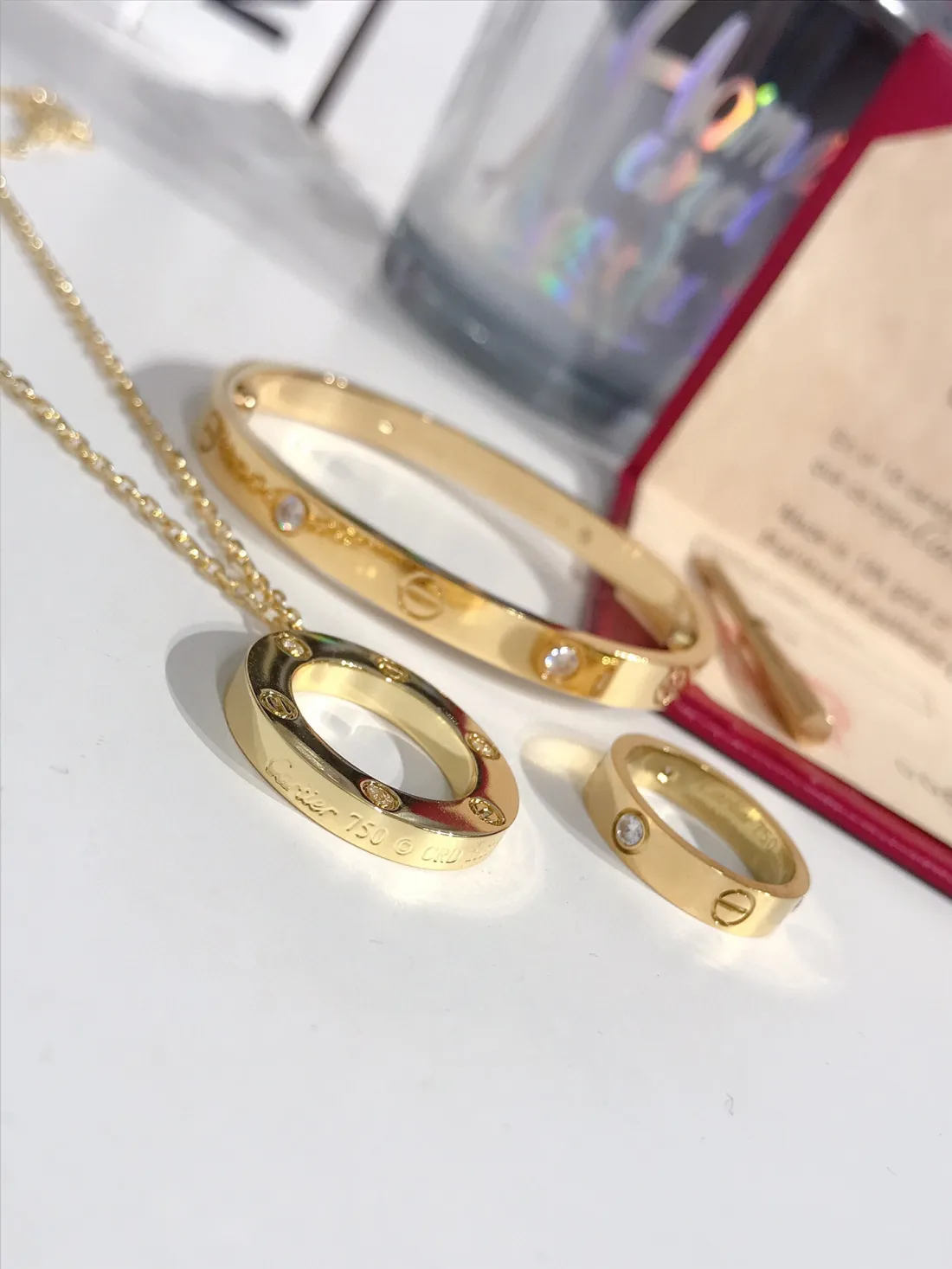 LOVE BRACELET, 4 DIAMONDS + LOVE RING, 3 DIAMONDS + LOVE NECKLACE, 3 DIAMONDS