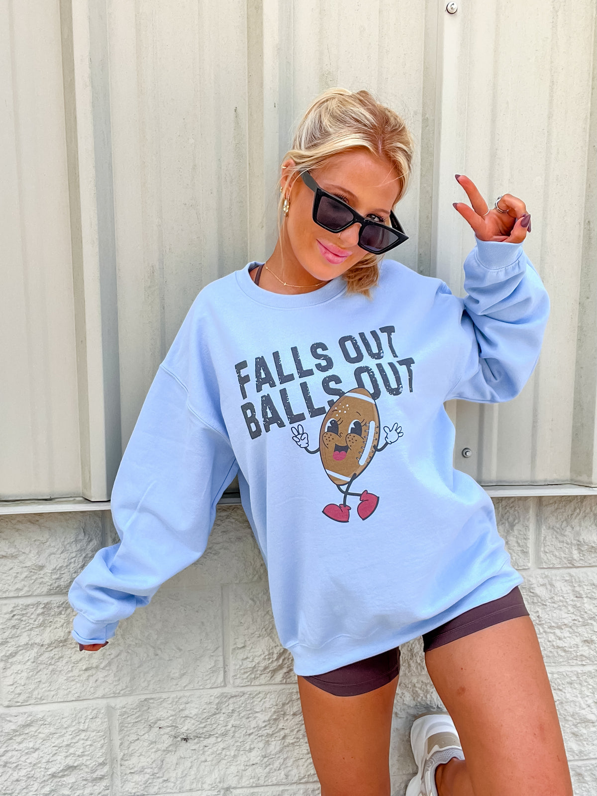 Football Falls Out Graphic Sweatshirt