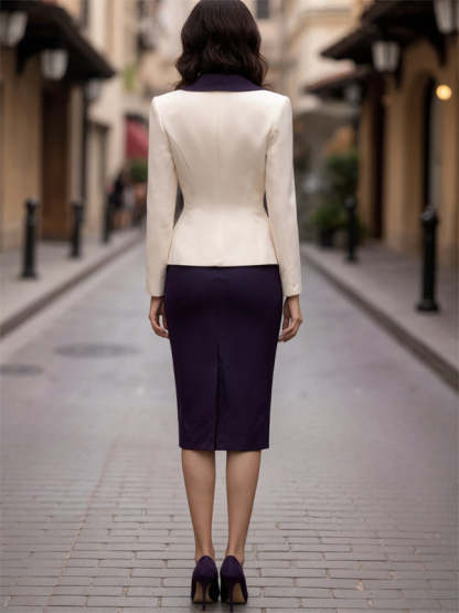 Two-piece suit with cream blazer and dark blue skirt