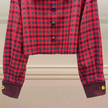 Short jacket with jewel-buttoned, checked velvet collar and long sleeves with embroidered lettering