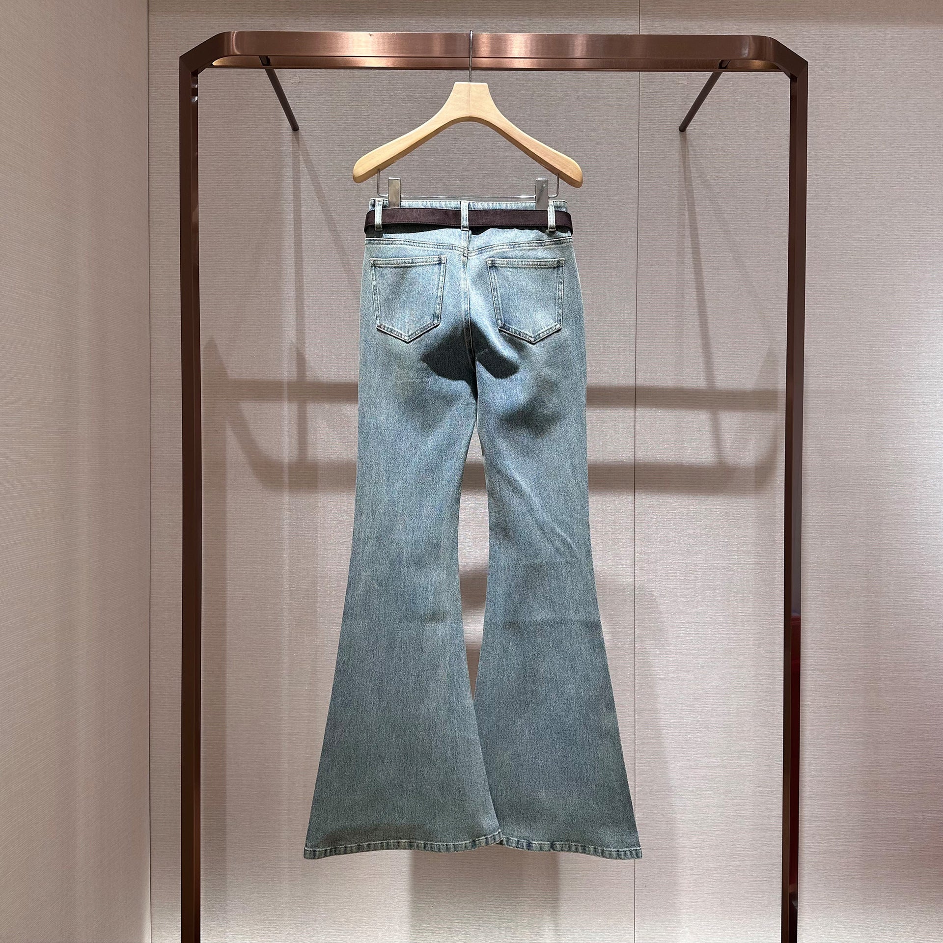 Blue high-waisted flared washed denim jeans