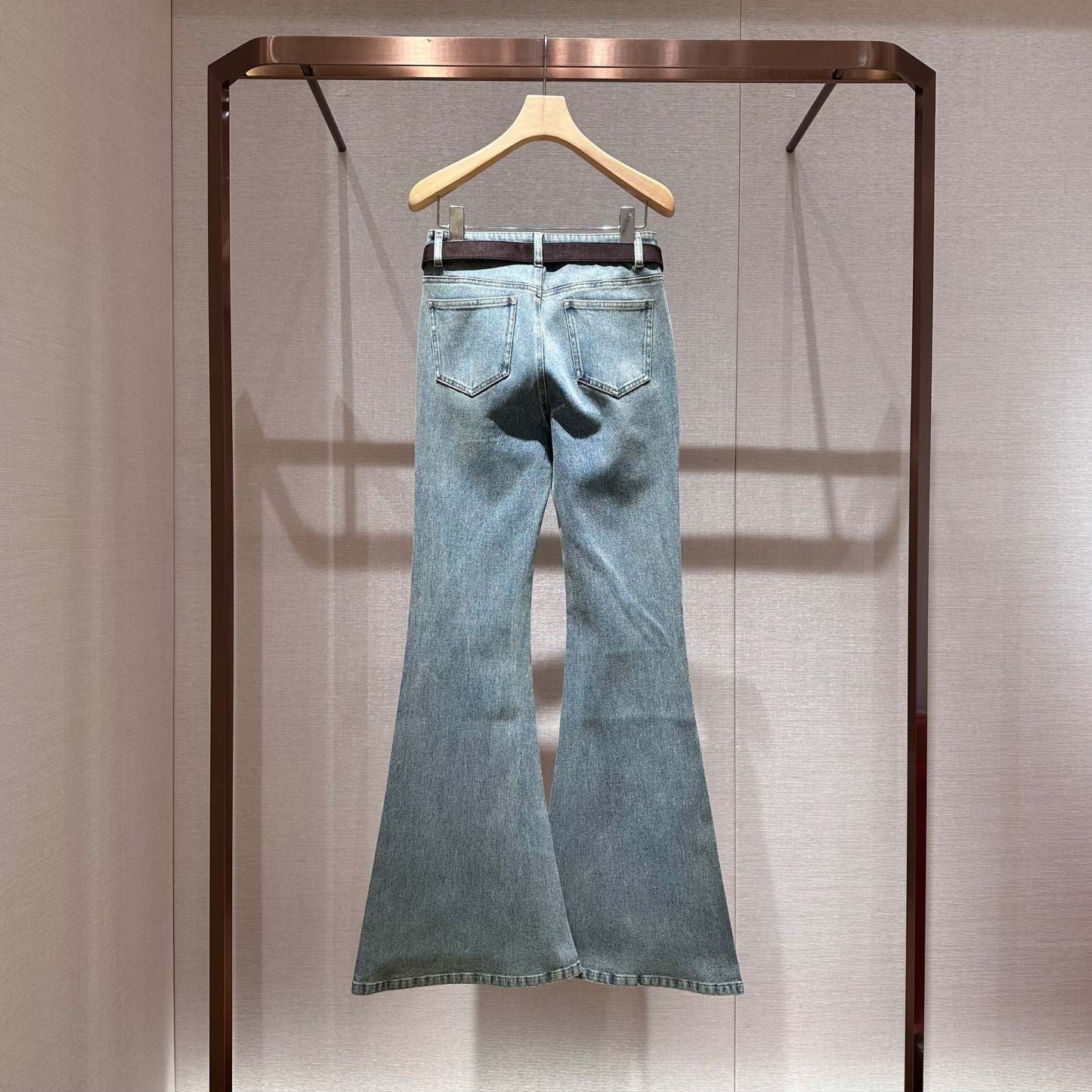 Blue high-waisted flared washed denim jeans