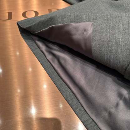 Gray single-breasted long-sleeved short jacket with stud embellishments