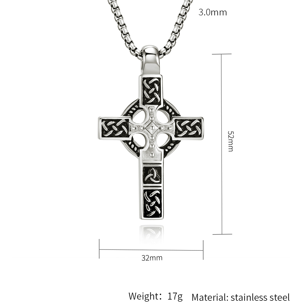 Celtic cross necklace on dark background