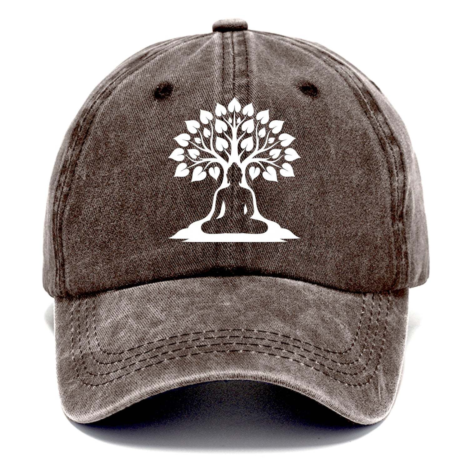 Buddha silhouette meditating - negative space forms bodhi tree - Classic Cap - Brown