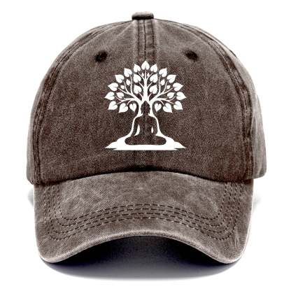 Buddha silhouette meditating - negative space forms bodhi tree - Classic Cap - Brown