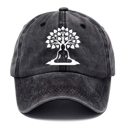 Buddha silhouette meditating - negative space forms bodhi tree - Classic Cap - Graphite