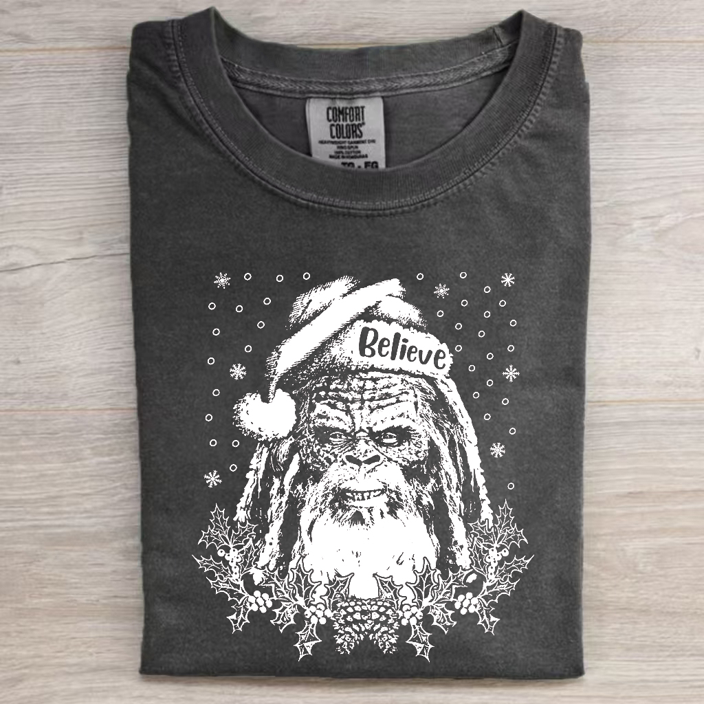 Bigfoot Santa Claus T Shirt Funny Christmas Tee Cool Xmas Clause Mens Womens Sasquatch Wearing Hat Yeti Holiday Tee