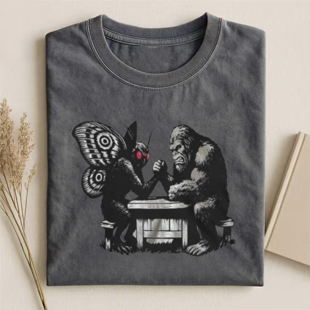 Mothman Vs Bigfoot Arm Wrestling Graphic T-shirt