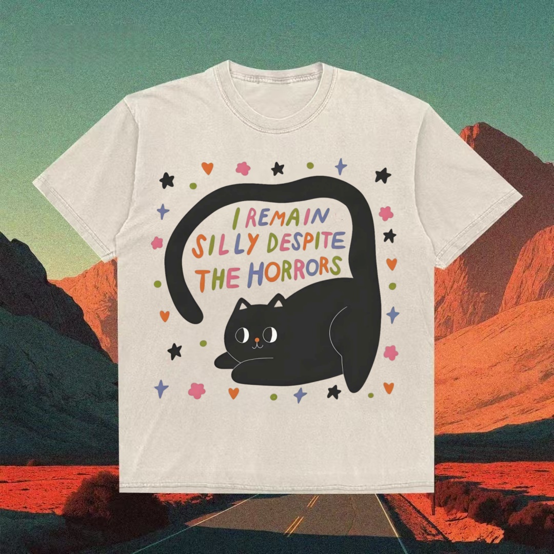 "I Remain Silly Despite The Horrors" Black Cat T-shirt