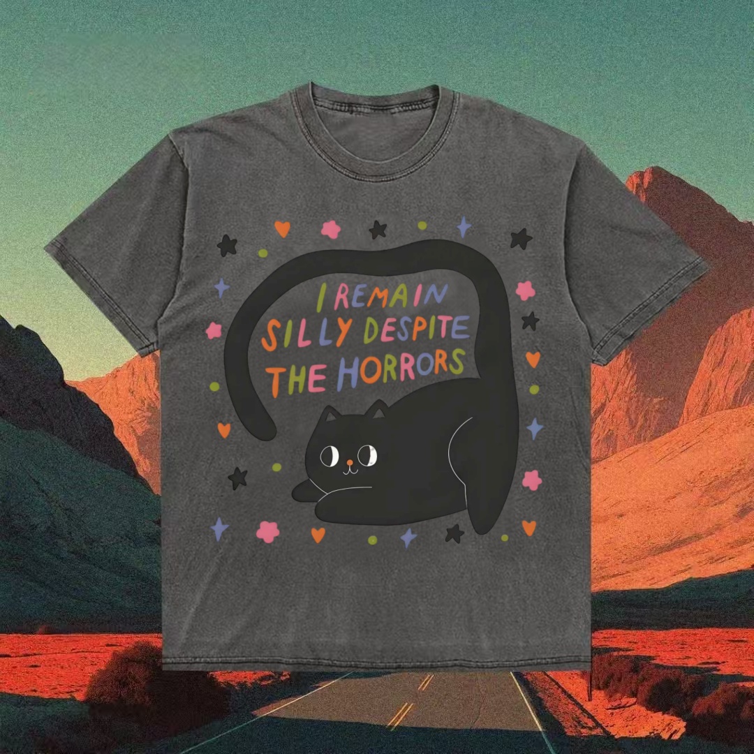 "I Remain Silly Despite The Horrors" Black Cat T-shirt