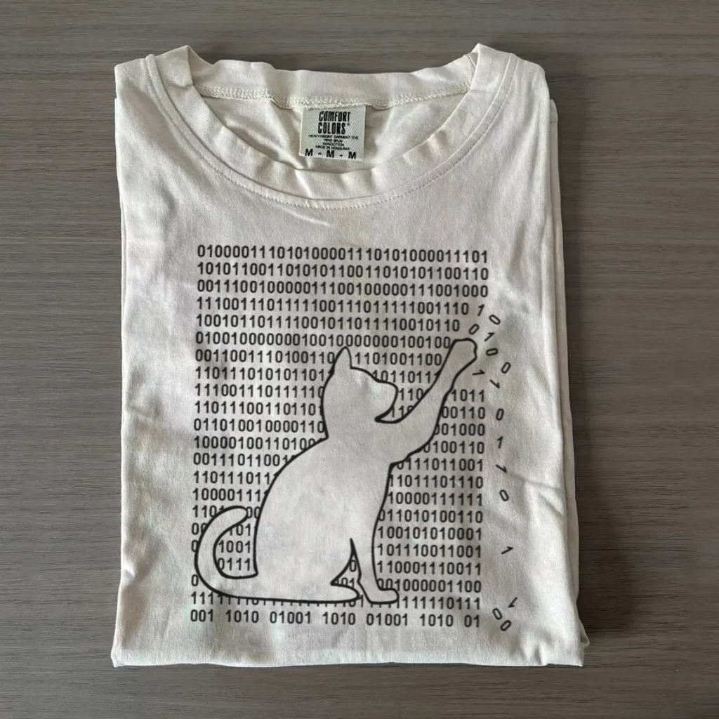 Funny Cat Is Playing With Binary Code Essential T-Shirt