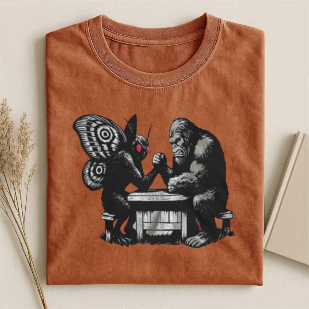 Mothman Vs Bigfoot Arm Wrestling Graphic T-shirt