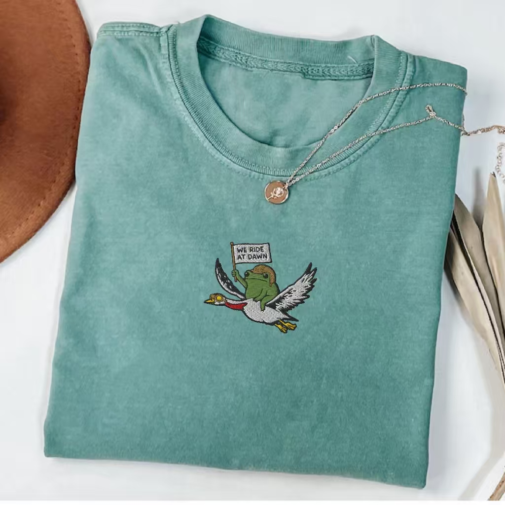 "We Ride At Dawn" Frog & Duck Embroidered T-shirt