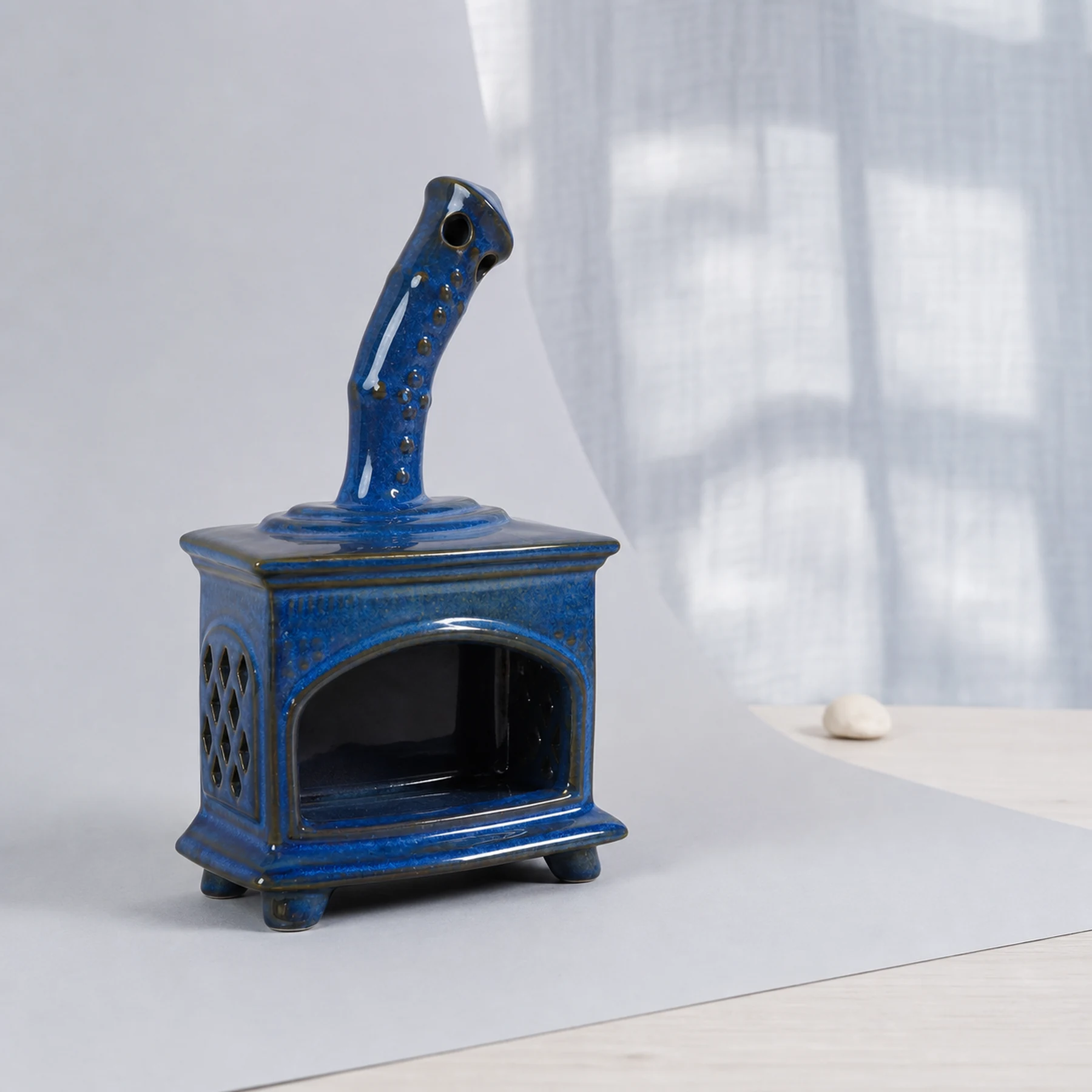 Blue ceramic fireplace incense holder clean three-quarter view