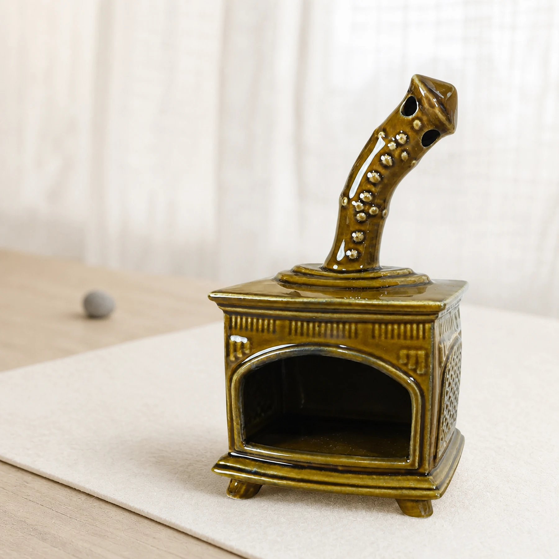 Brown ceramic fireplace incense holder clean three-quarter view