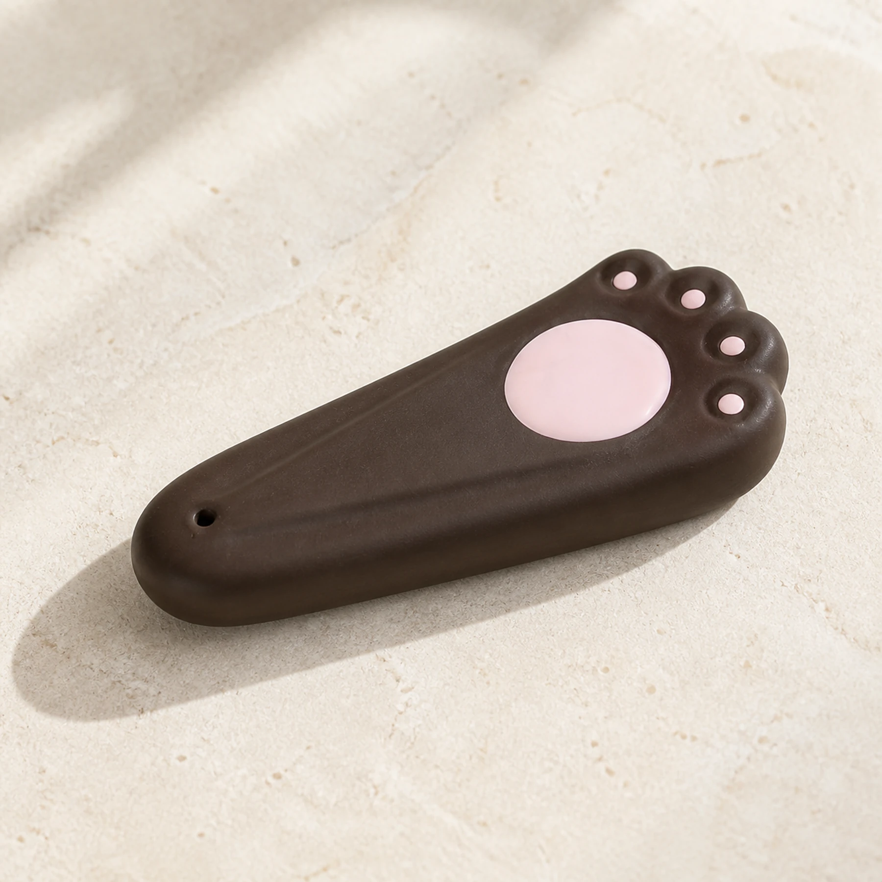 Dark brown cat paw stick incense holder clean product view