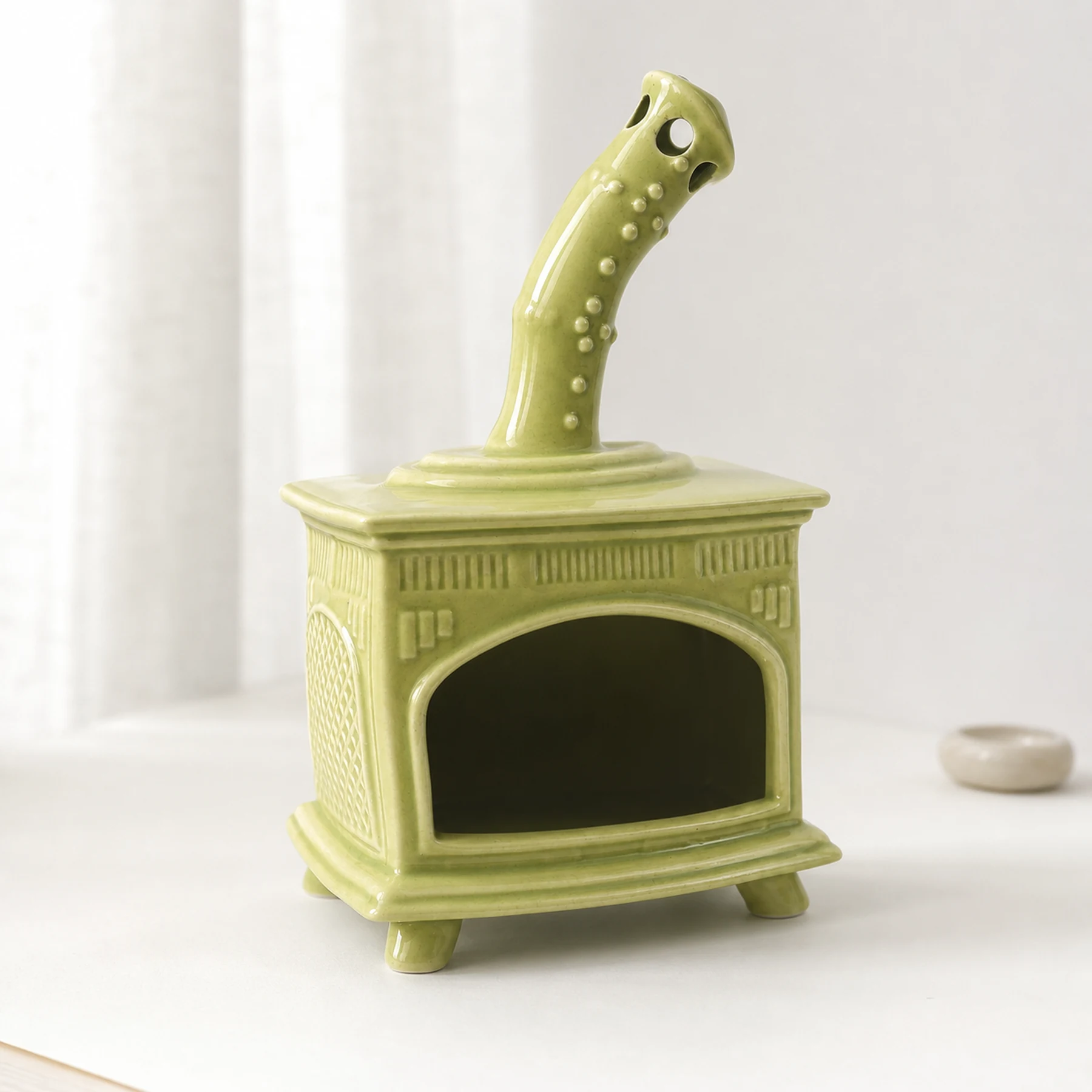 Light Green ceramic fireplace incense holder clean three-quarter view