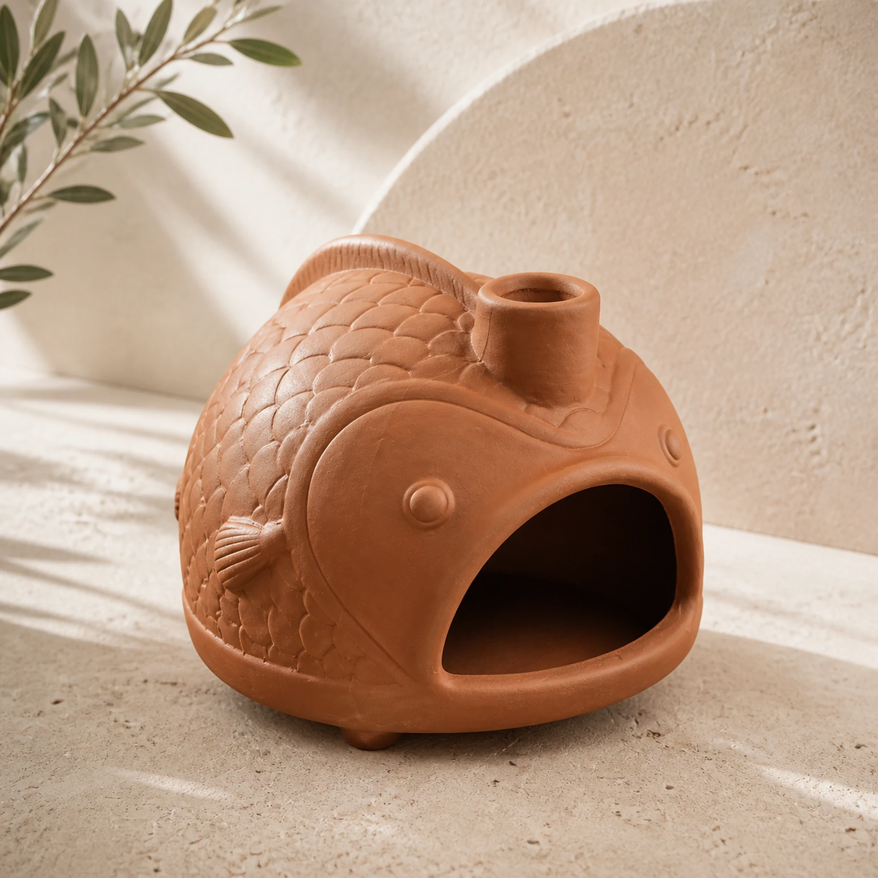 Terracotta fish incense holder clean three-quarter view