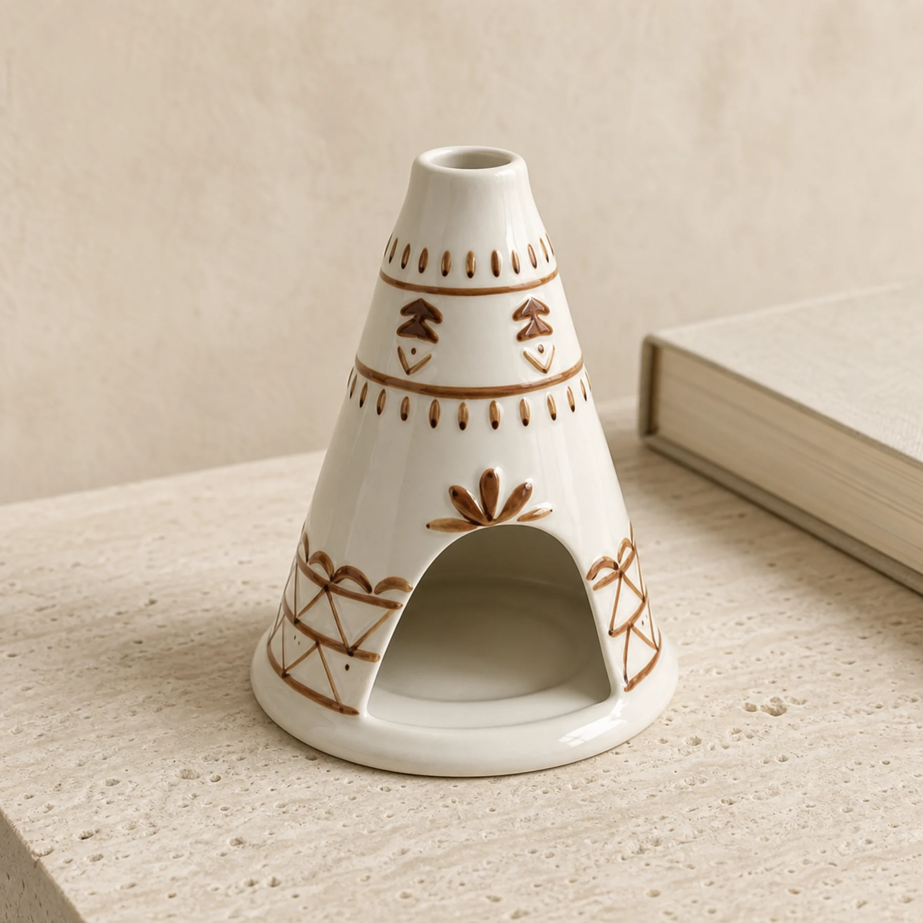 White ceramic chimney Palo Santo holder on pale travertine