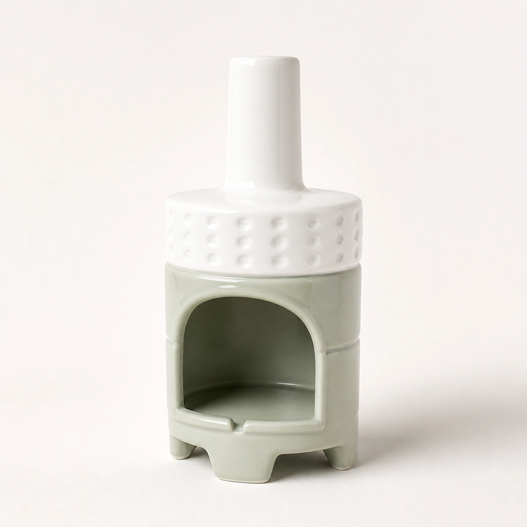 White Green two-tone ceramic Palo Santo holder structural proof showing its four-foot body, dimpled lid, and smooth chimney