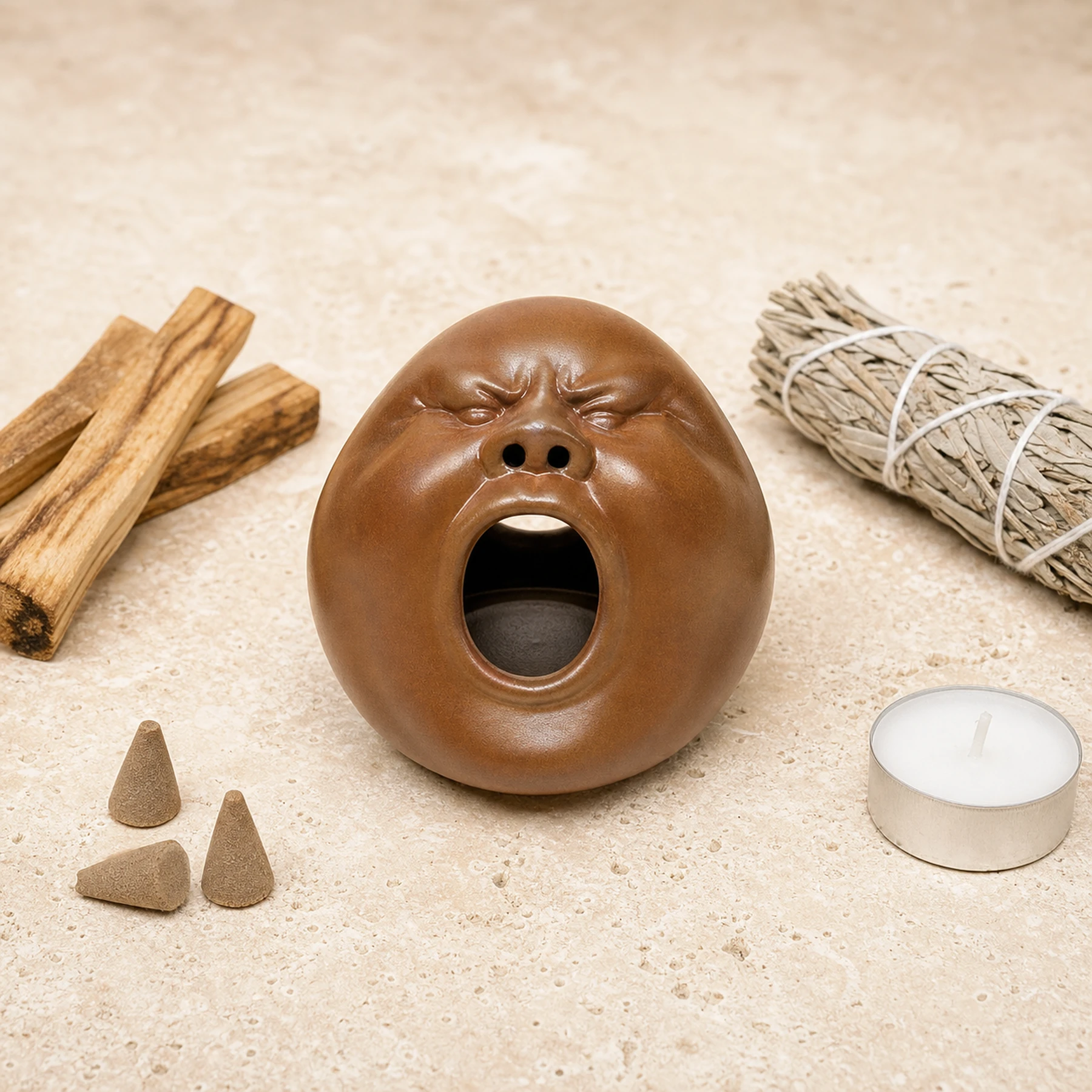 Brown ceramic face holder with compatible incense materials