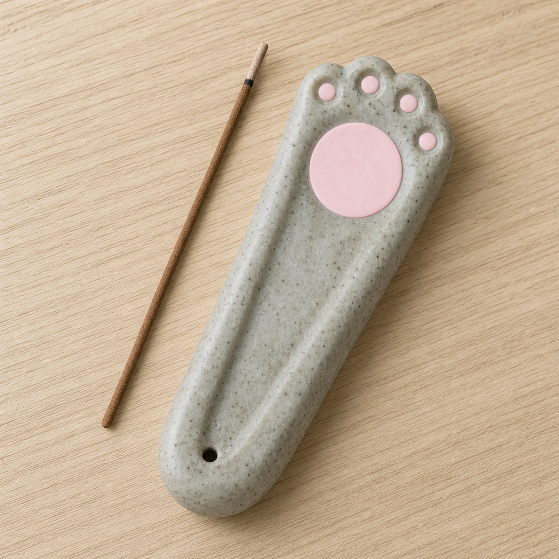 Speckled gray ceramic paw incense holder top design and ash channel