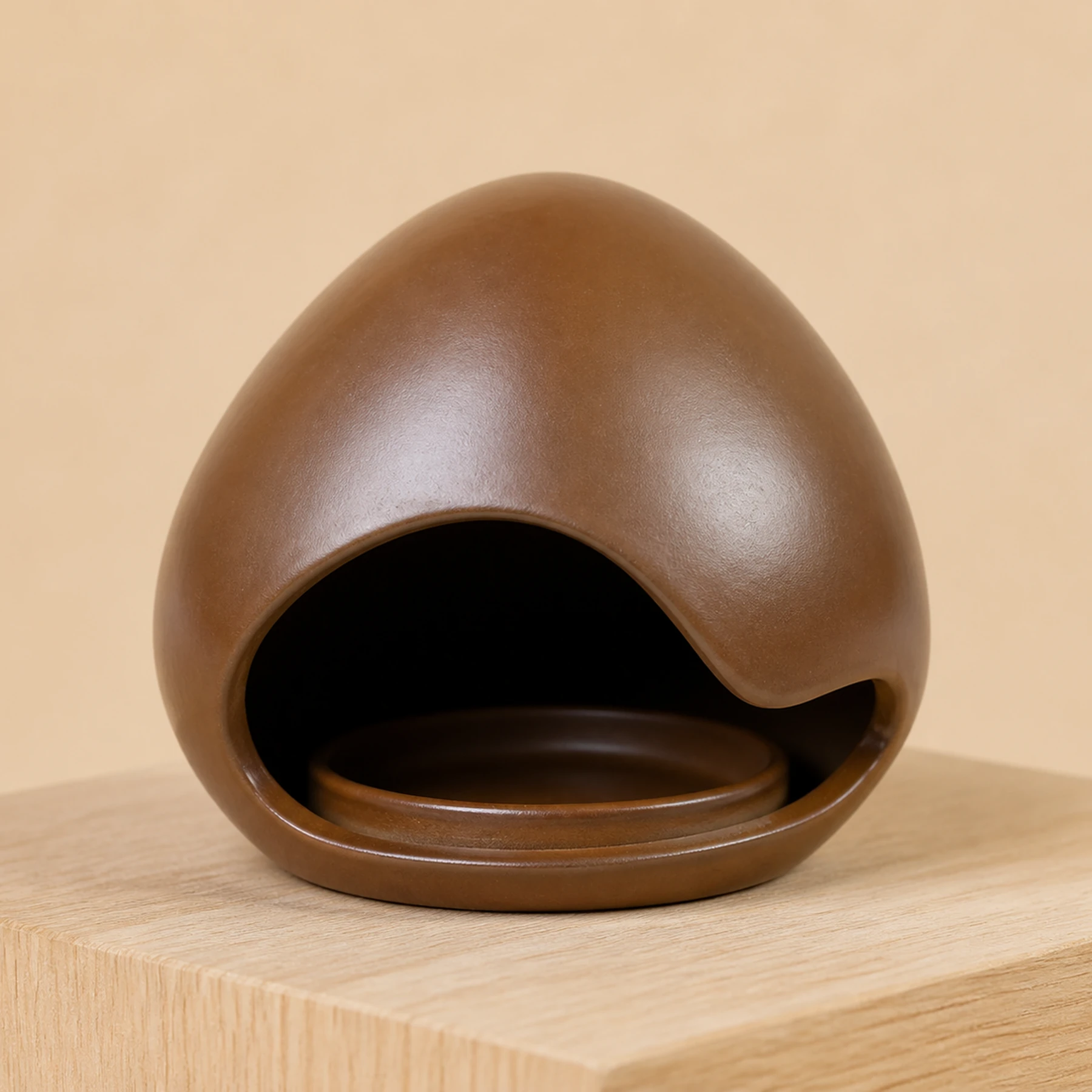 Brown ceramic face incense holder rear access and integrated tray