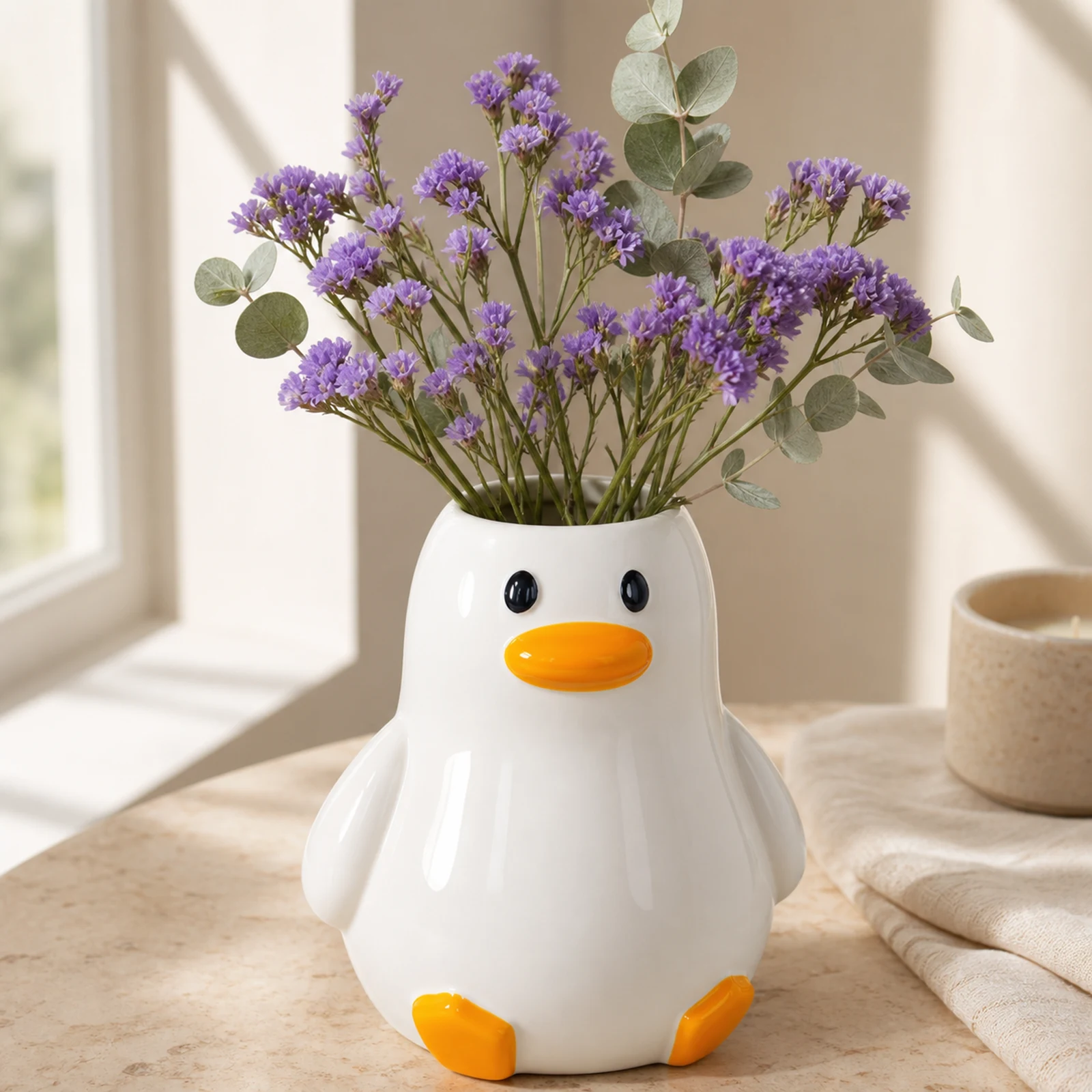 MOUGIGI handcrafted ceramic duck vase with lavender statice in window light