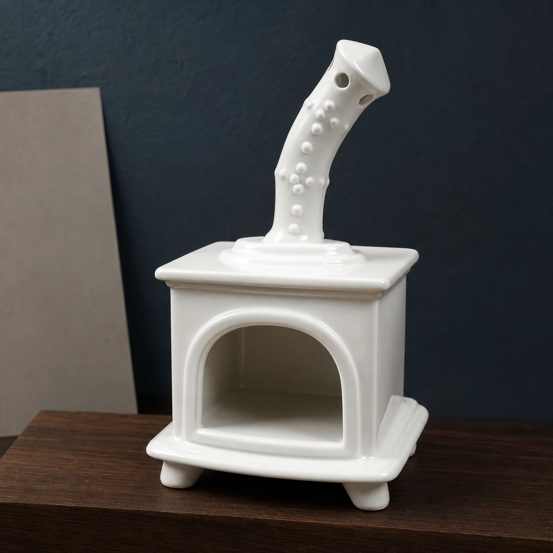 White ceramic fireplace incense holder curved chimney and glaze detail