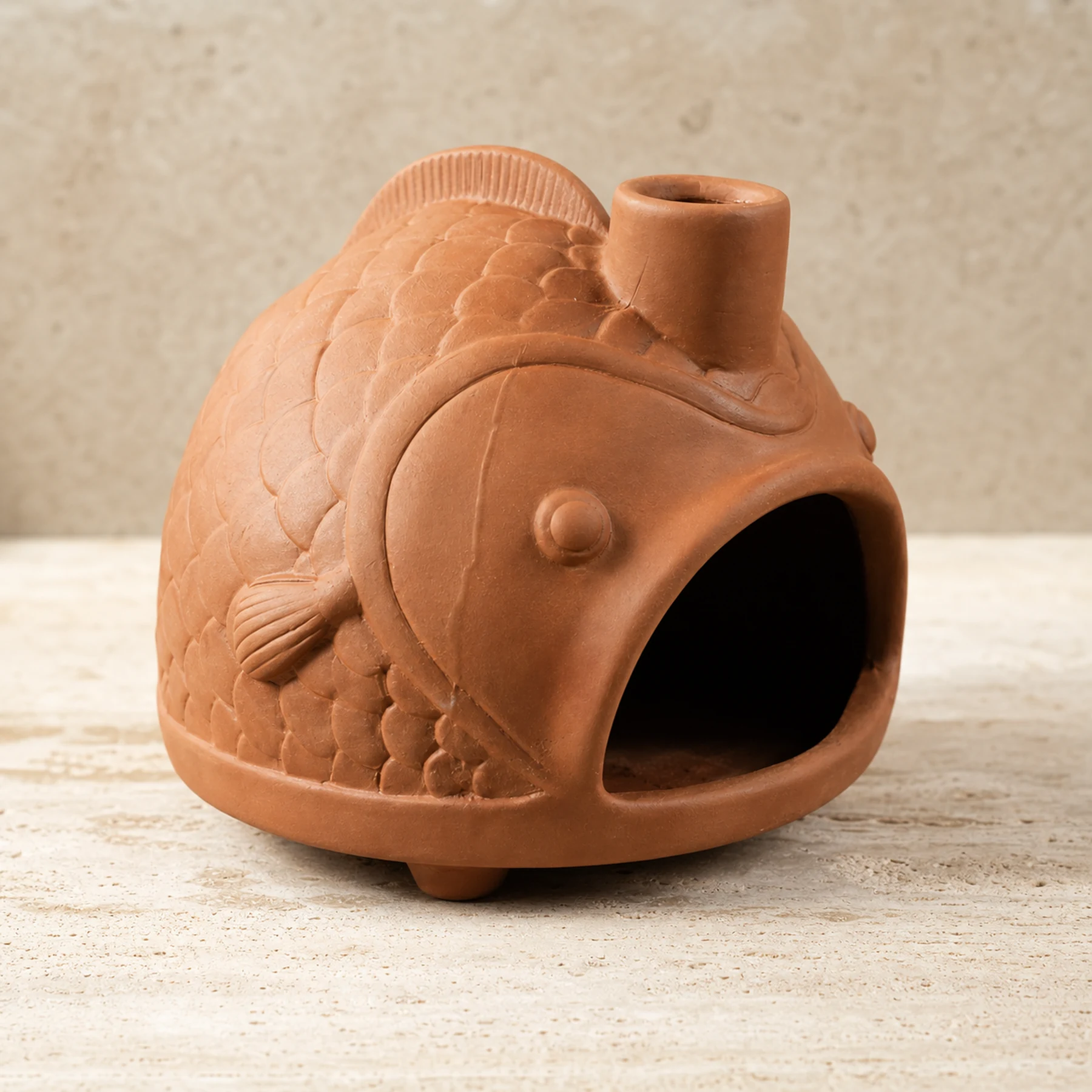 Terracotta fish incense holder handcrafted clay detail
