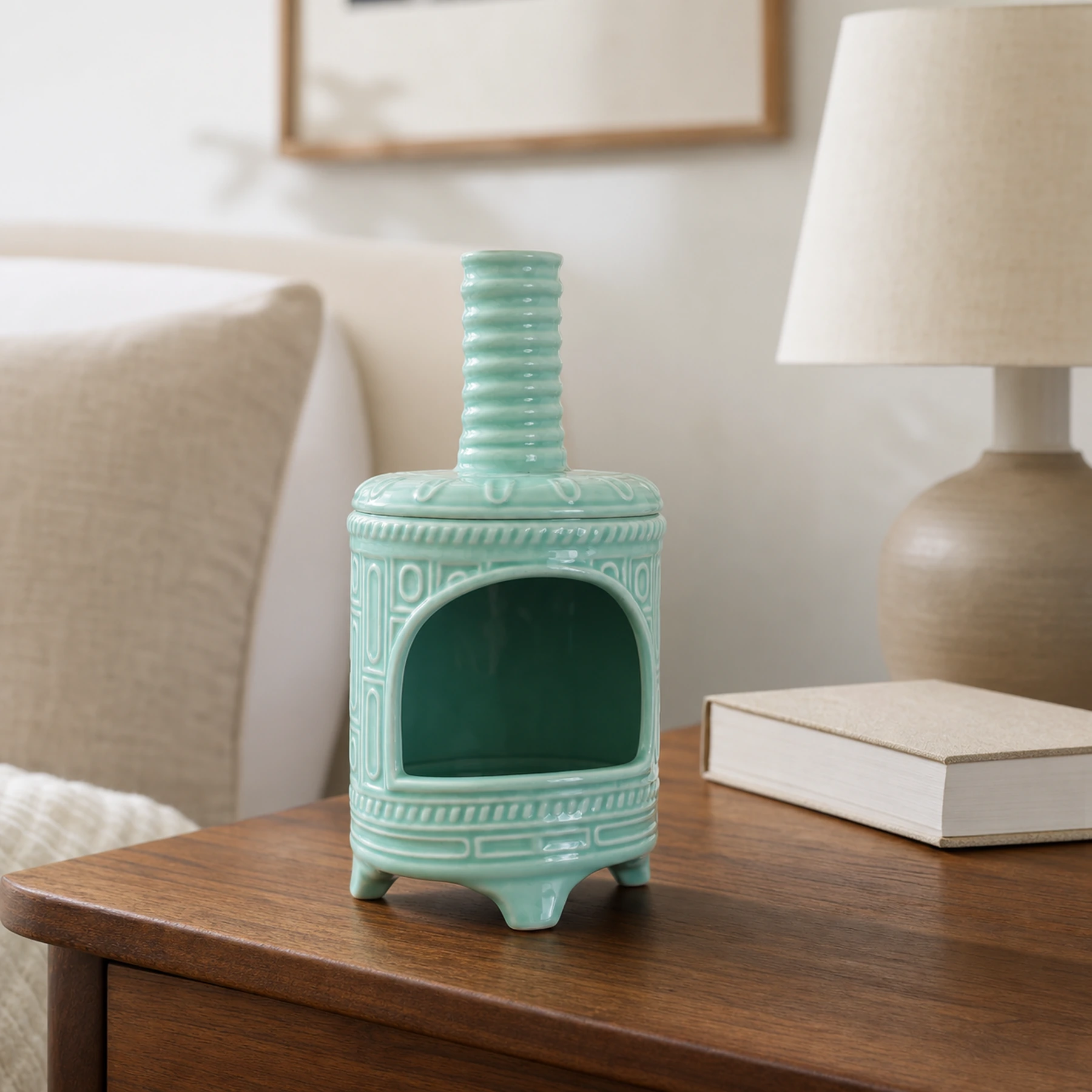 Light Green ceramic incense burner displayed empty in an ordinary home setting