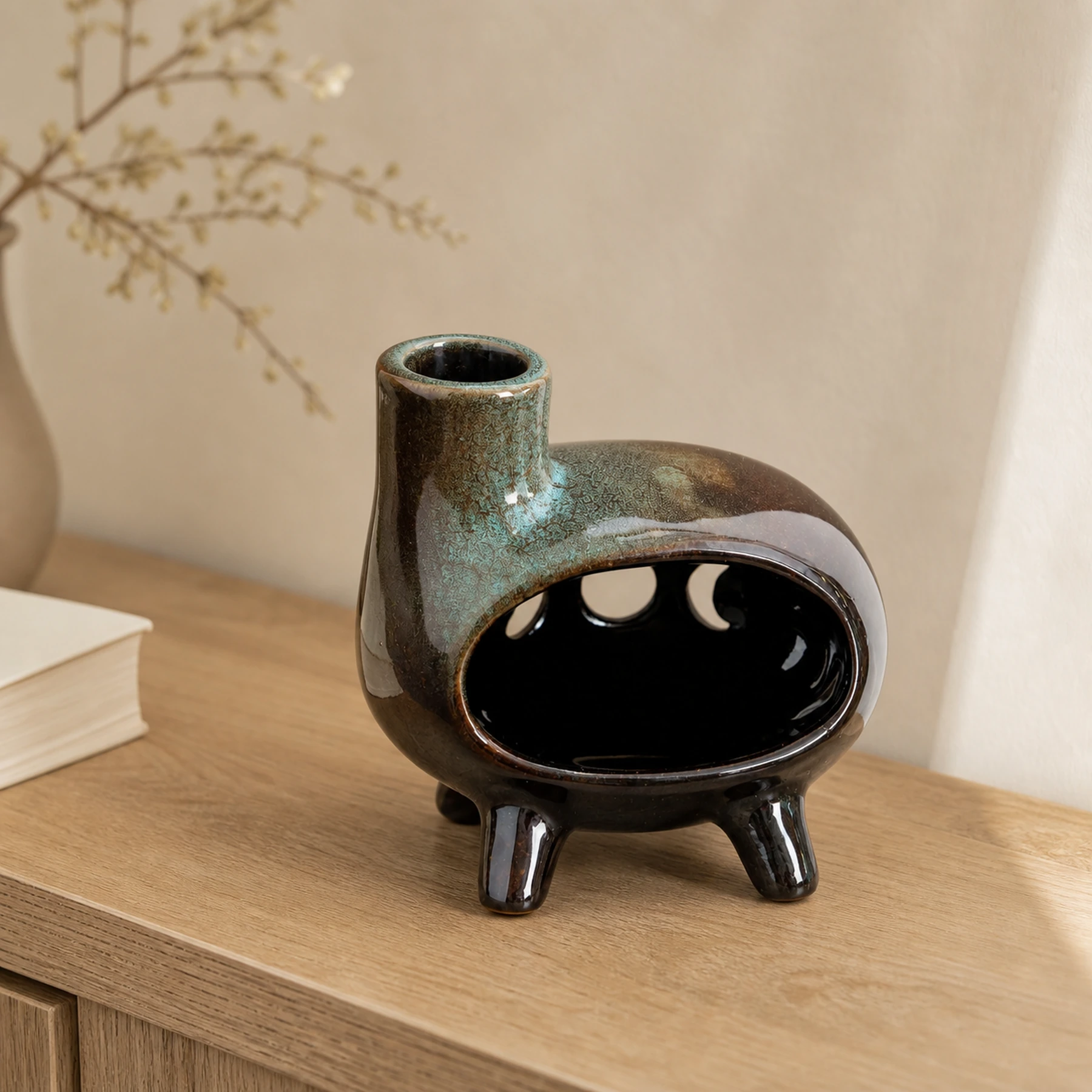Green glaze ceramic Palo Santo holder clean front view on warm limestone