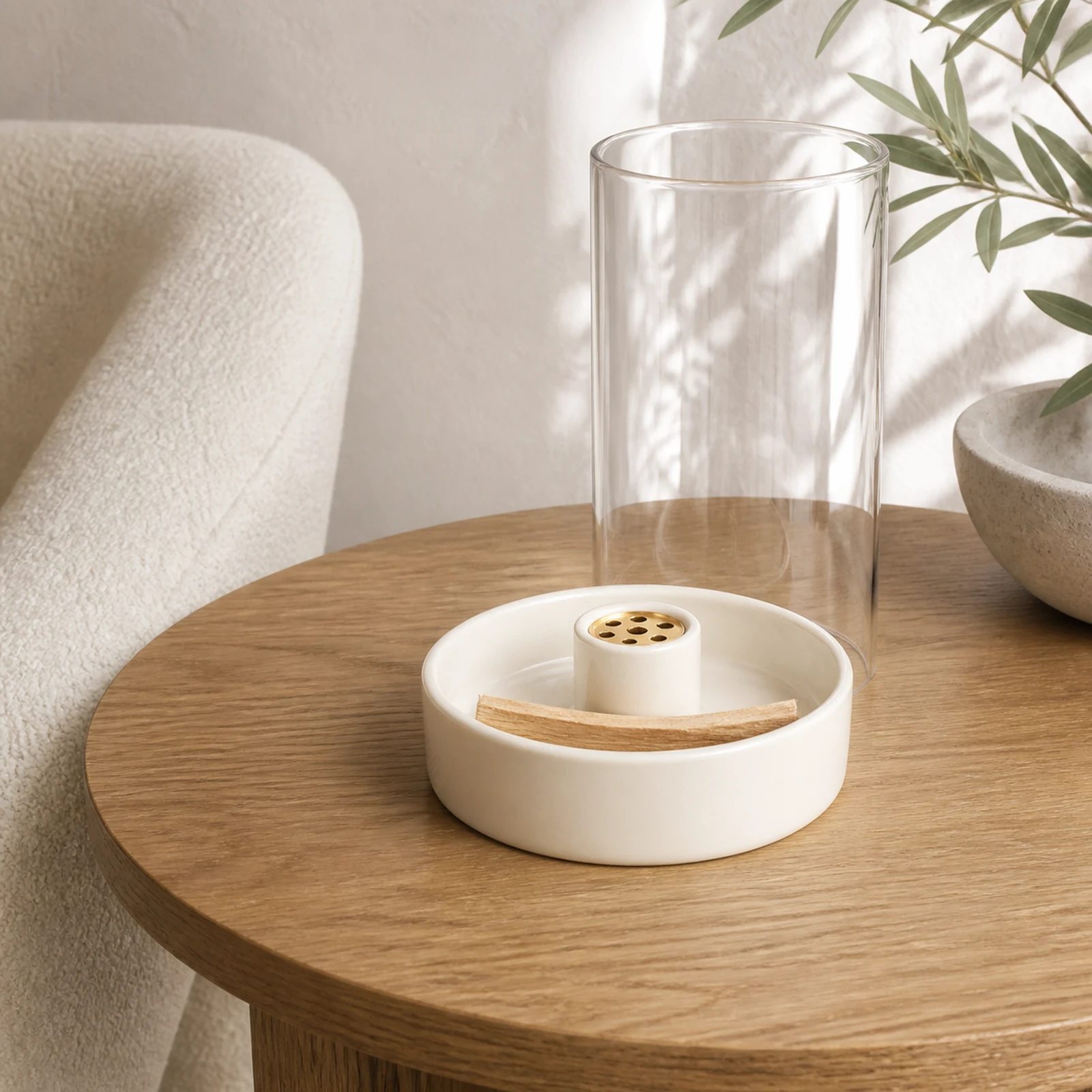 9-hole ceramic incense burner with removable glass cover in a warm home setting