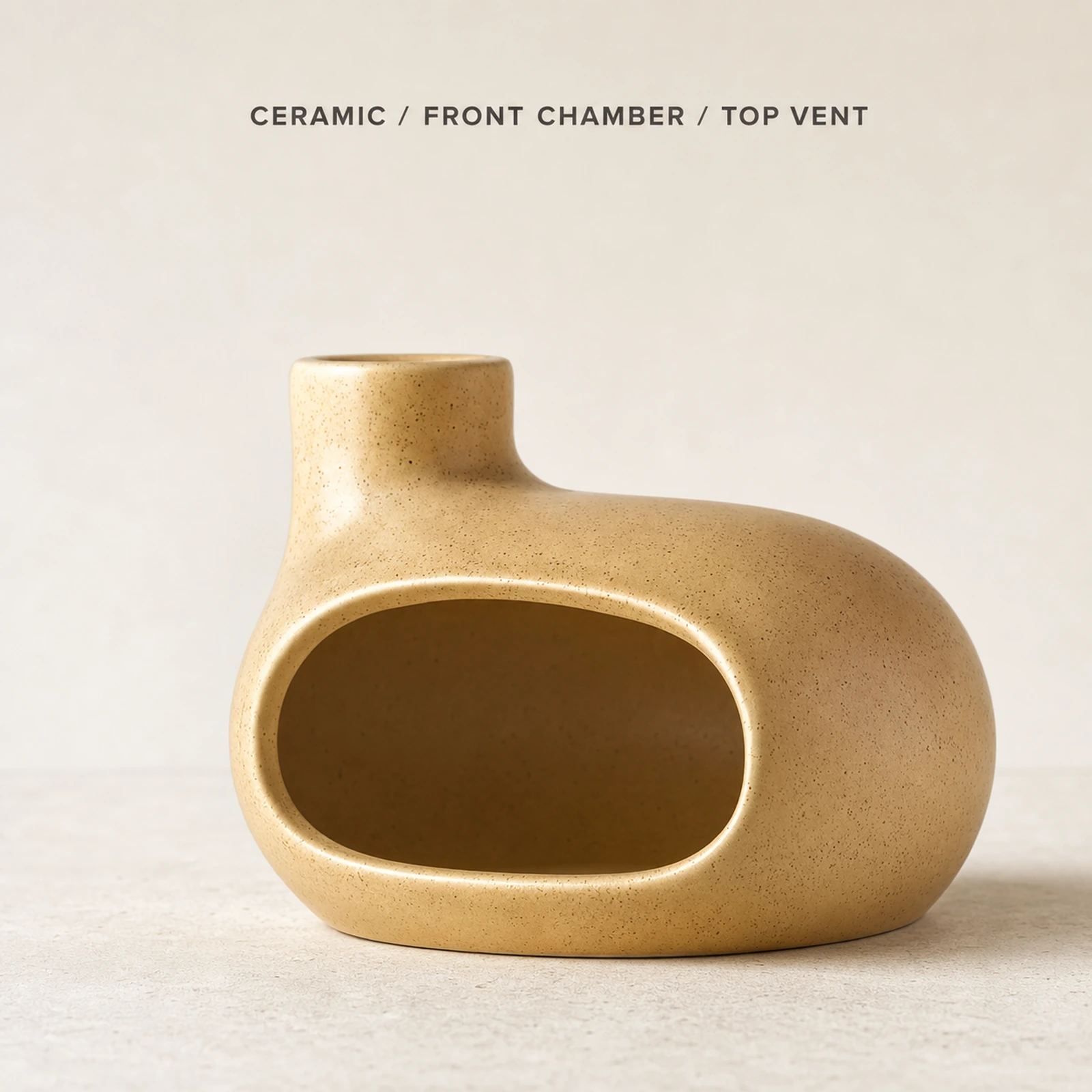 Beige Classic Ceramic Palo Santo & Sage Burner, fact view identifying the ceramic body, front chamber, and top vent.