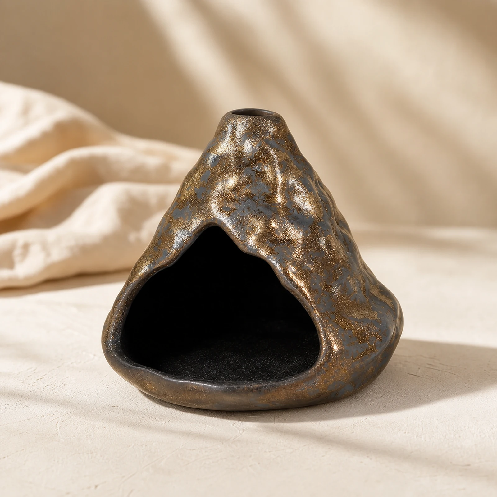 Black-Gold ceramic zongzi incense holder clean front three-quarter view
