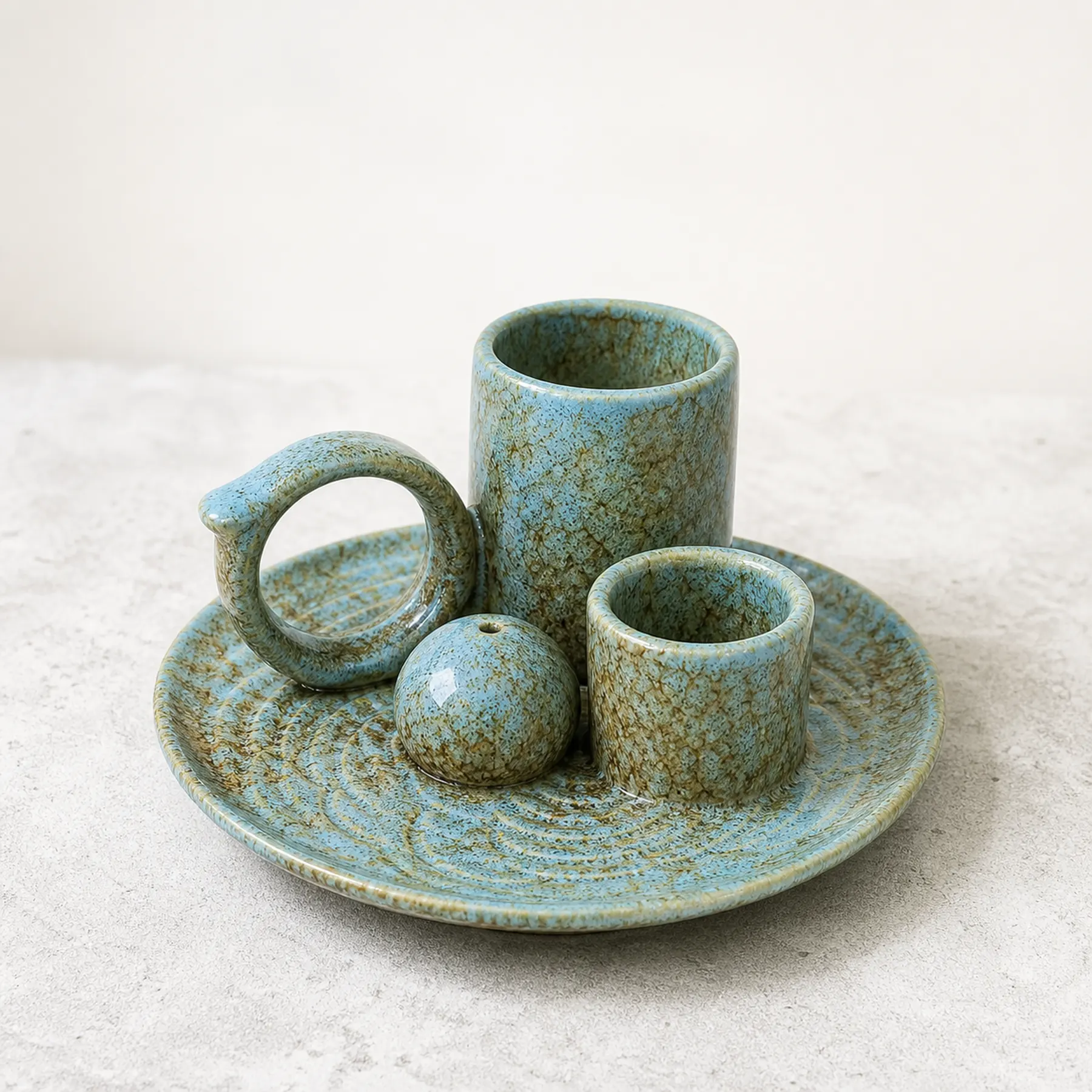 Blue glaze 5-in-1 ceramic smudge bowl empty in a clean three-quarter product view