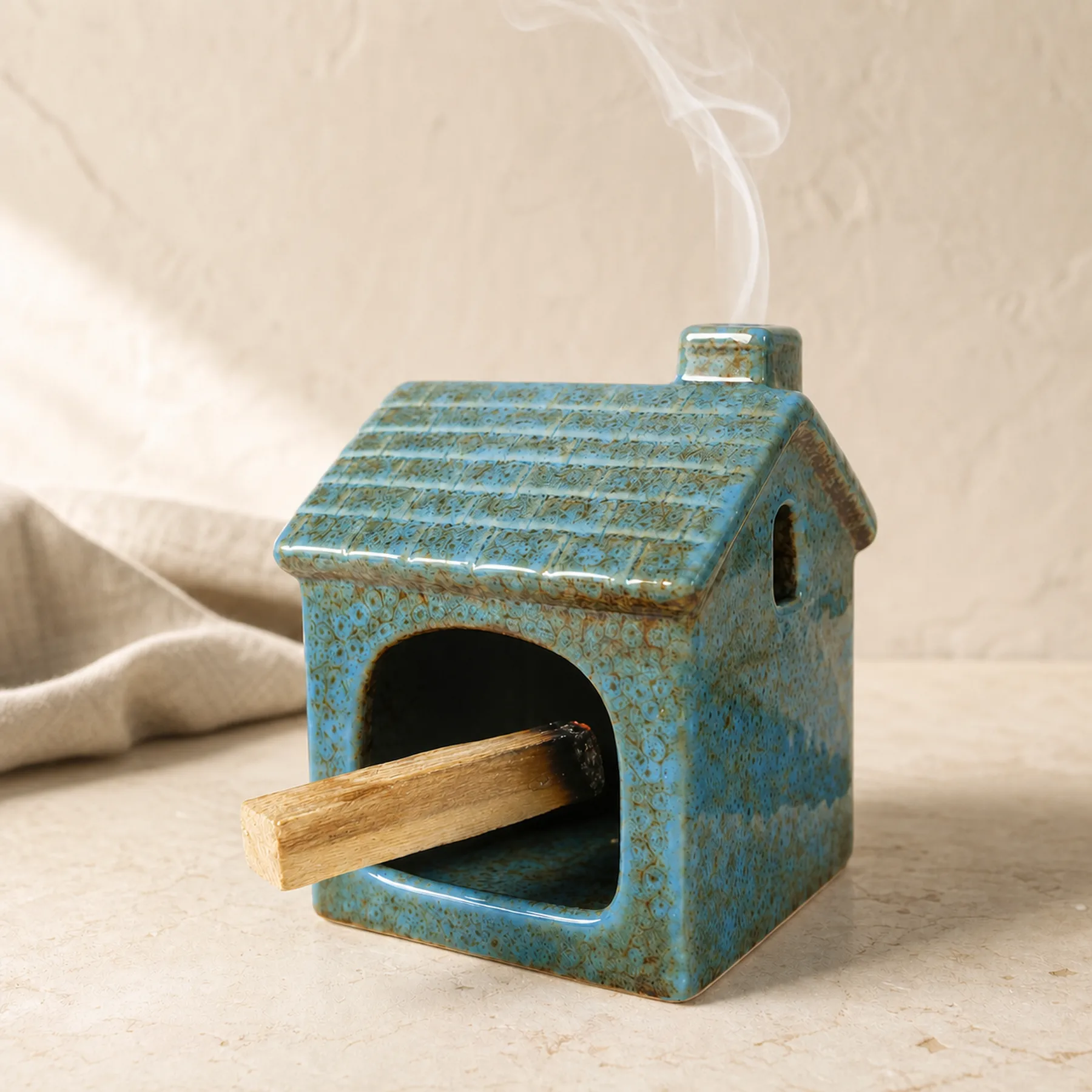Blue ceramic house Palo Santo holder with chimney-only smoke