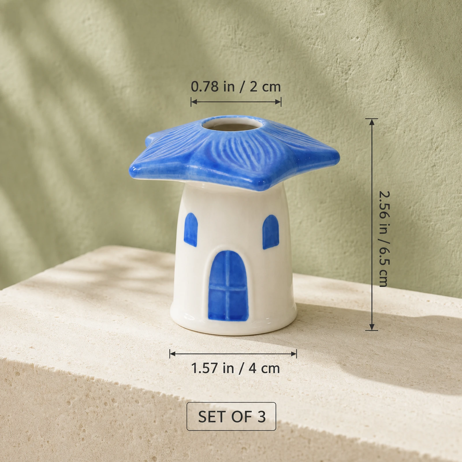 Blue mushroom house ceramic bud vase dimensions: 6.5 cm high, 4 cm wide, 2 cm opening
