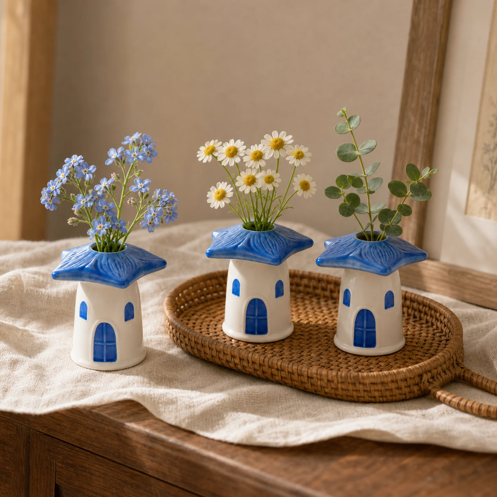 Blue mushroom house vase trio in warm walnut and linen home styling