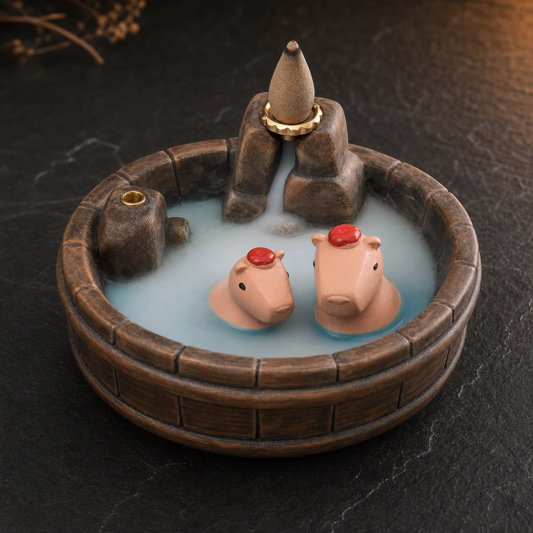 Brown wood-grain resin capybara incense burner showing a smoldering backflow cone and waterfall smoke path