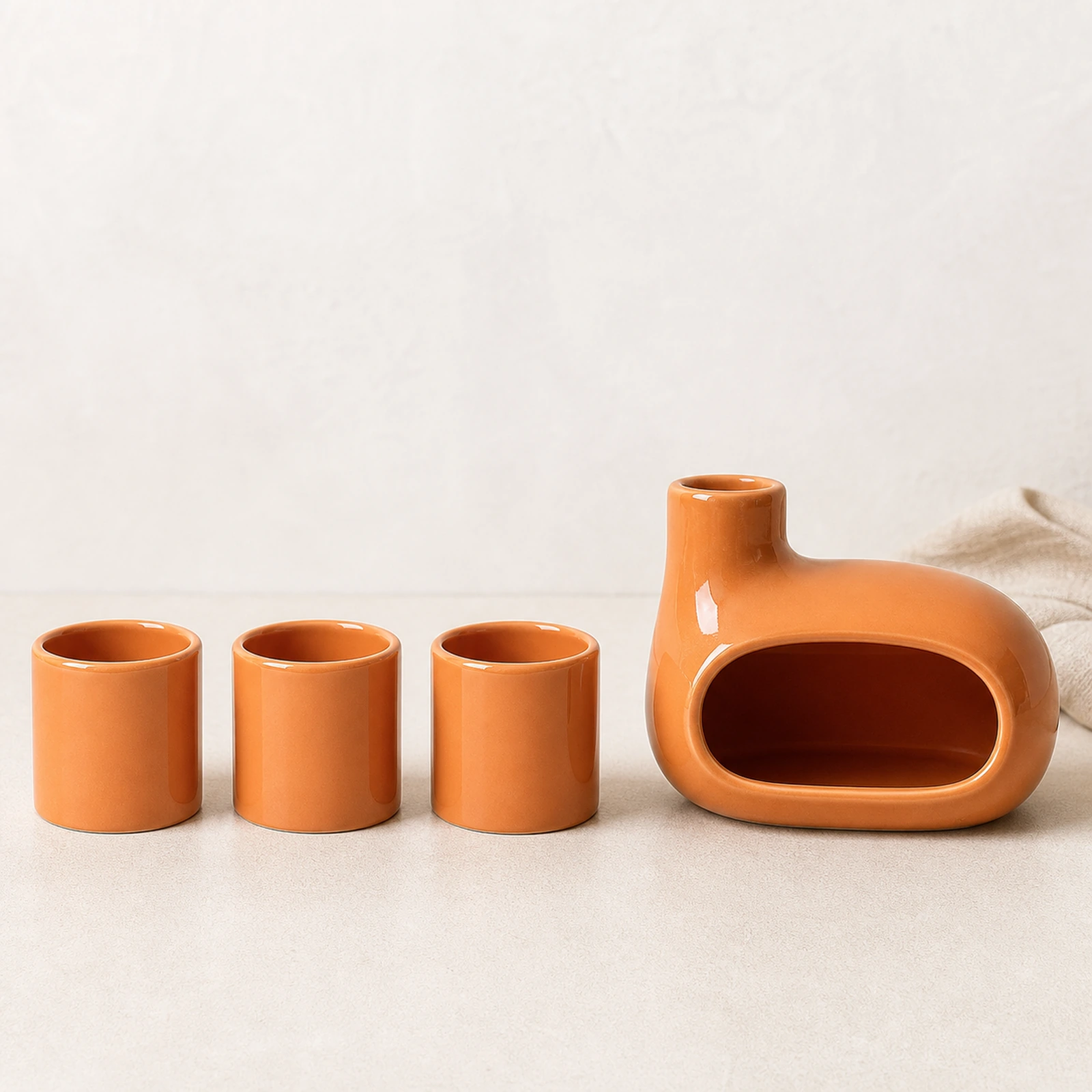 Glazed orange burner and three-holder set Classic Ceramic Palo Santo & Sage Burner, clean front view showing the ceramic chamber and top vent.