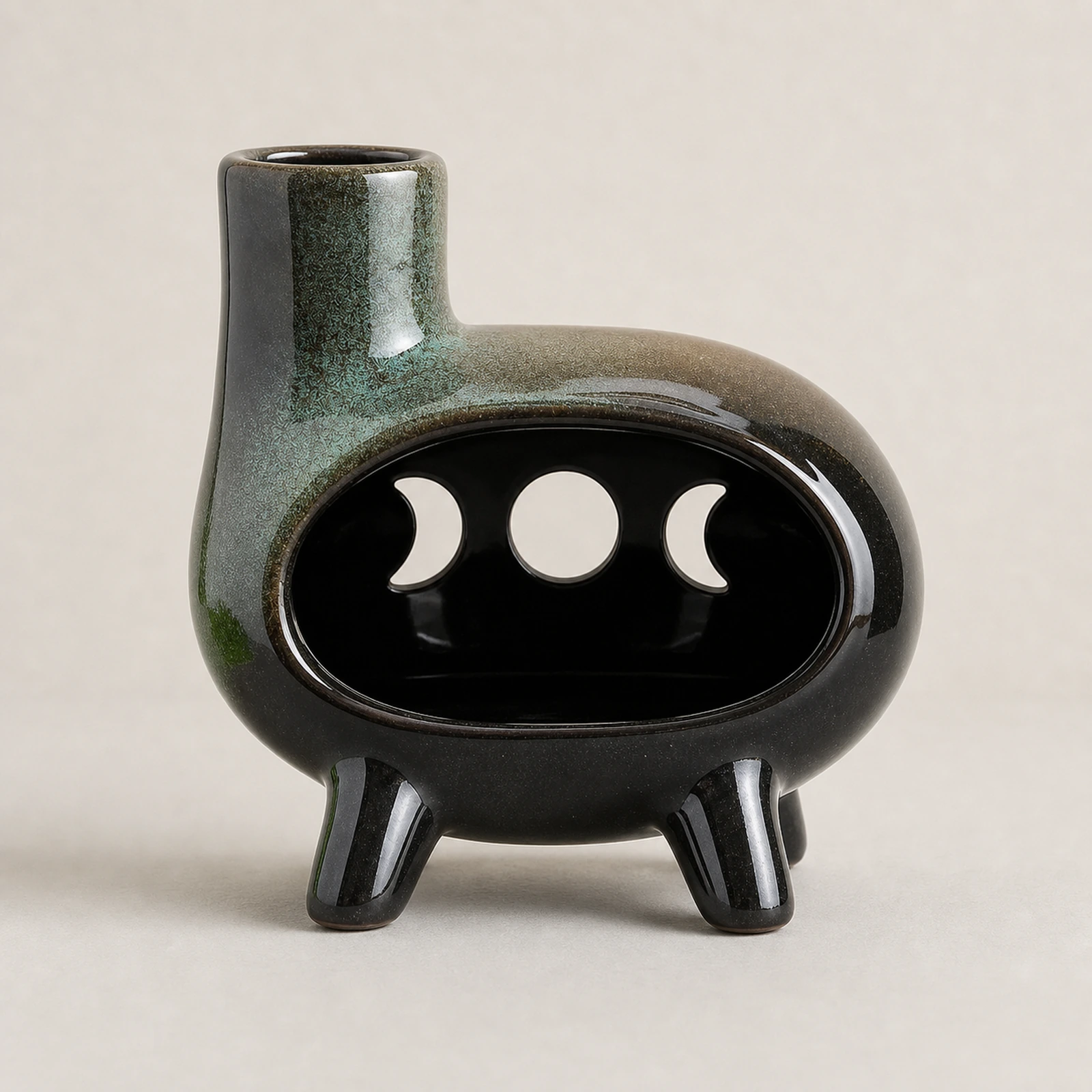 Green glaze four-foot moon-phase Classic Ceramic Palo Santo & Sage Burner, clean front view showing the ceramic chamber and top vent.