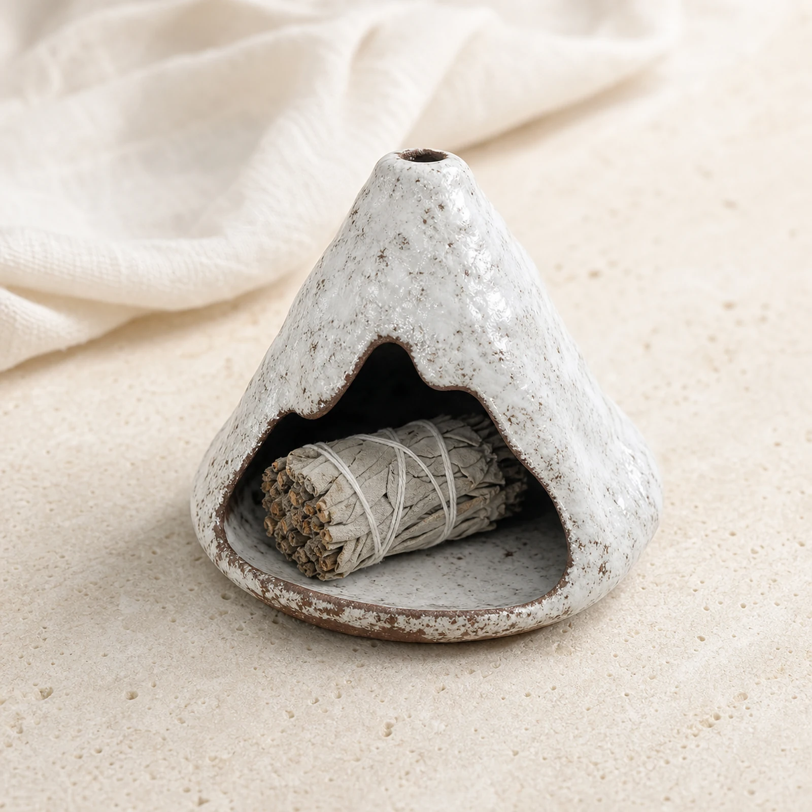 Kiln-Fired Pure White ceramic zongzi incense holder with a short unlit sage piece resting inside