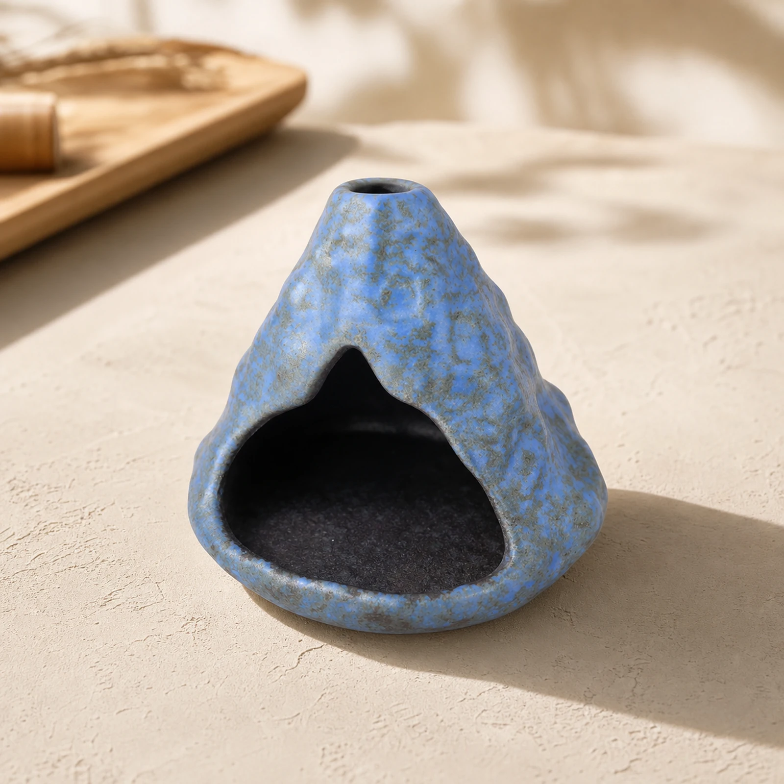 Light Blue ceramic zongzi incense holder clean front three-quarter view
