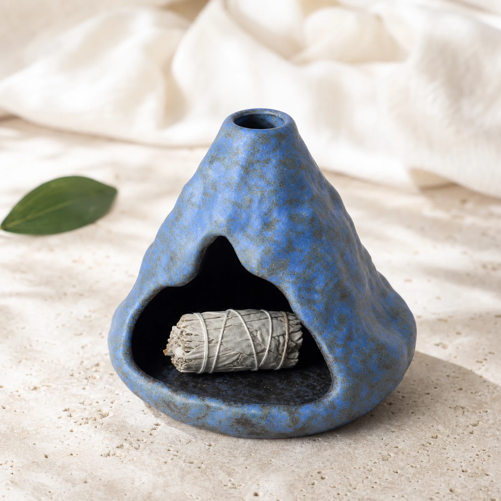 Light Blue ceramic zongzi incense holder with a short unlit sage piece resting inside
