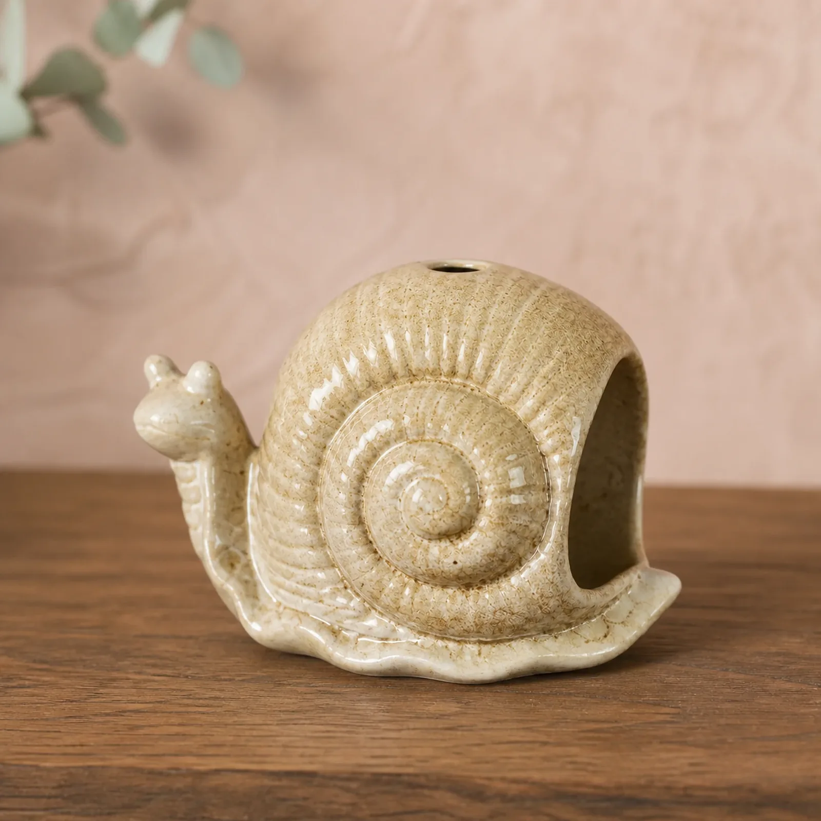 Brown ceramic snail incense burner clean three-quarter product view