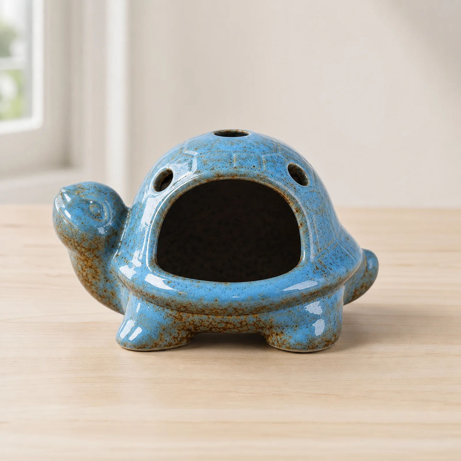 Blue speckled ceramic turtle Palo Santo holder clean front view