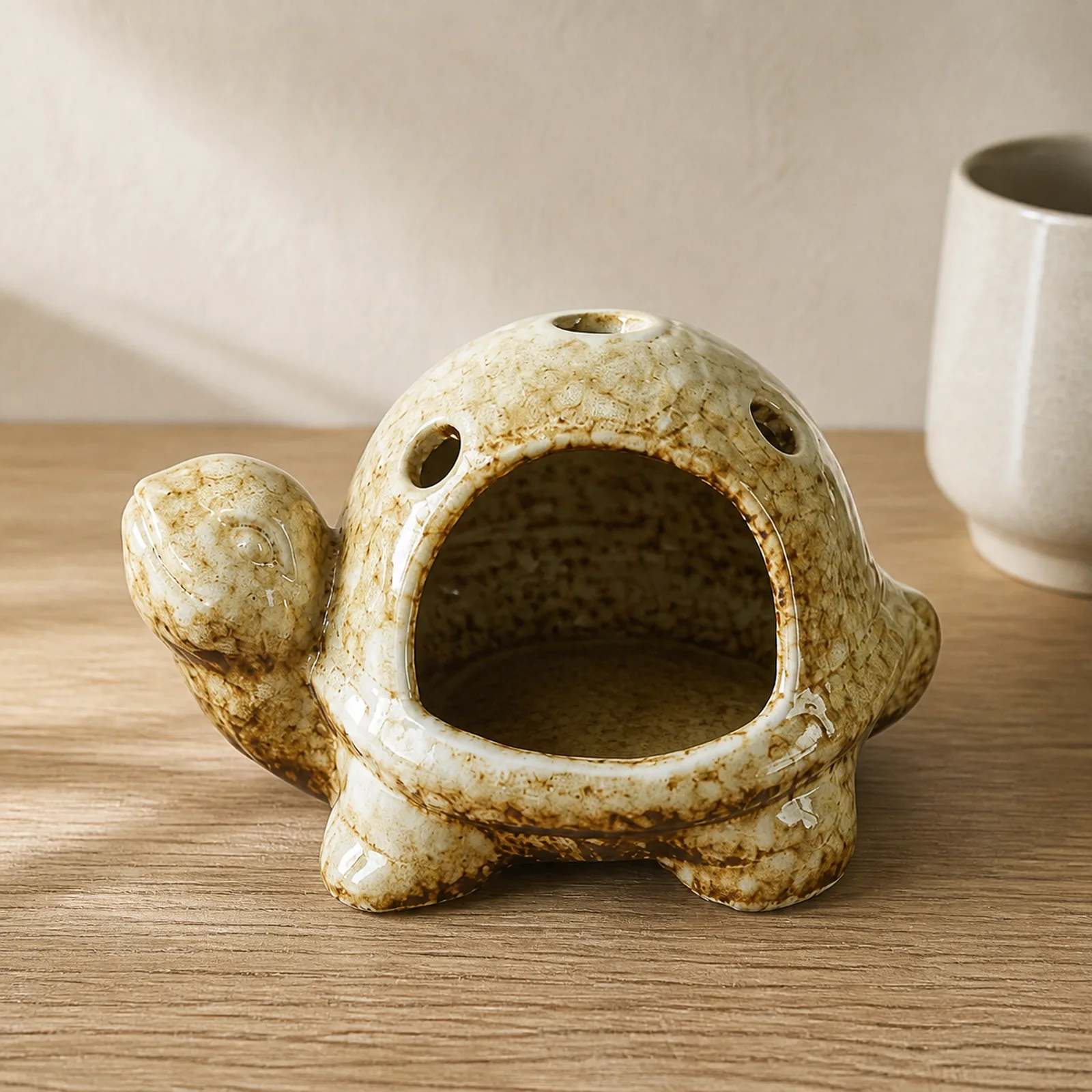 Brown kiln-effect ceramic turtle Palo Santo holder clean front view